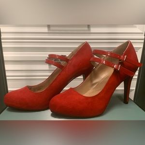 Pretty red sueded high heels. Size 6.5